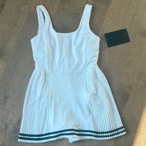 Tuckernuck White Pleated Tennis Romper with Green Trim